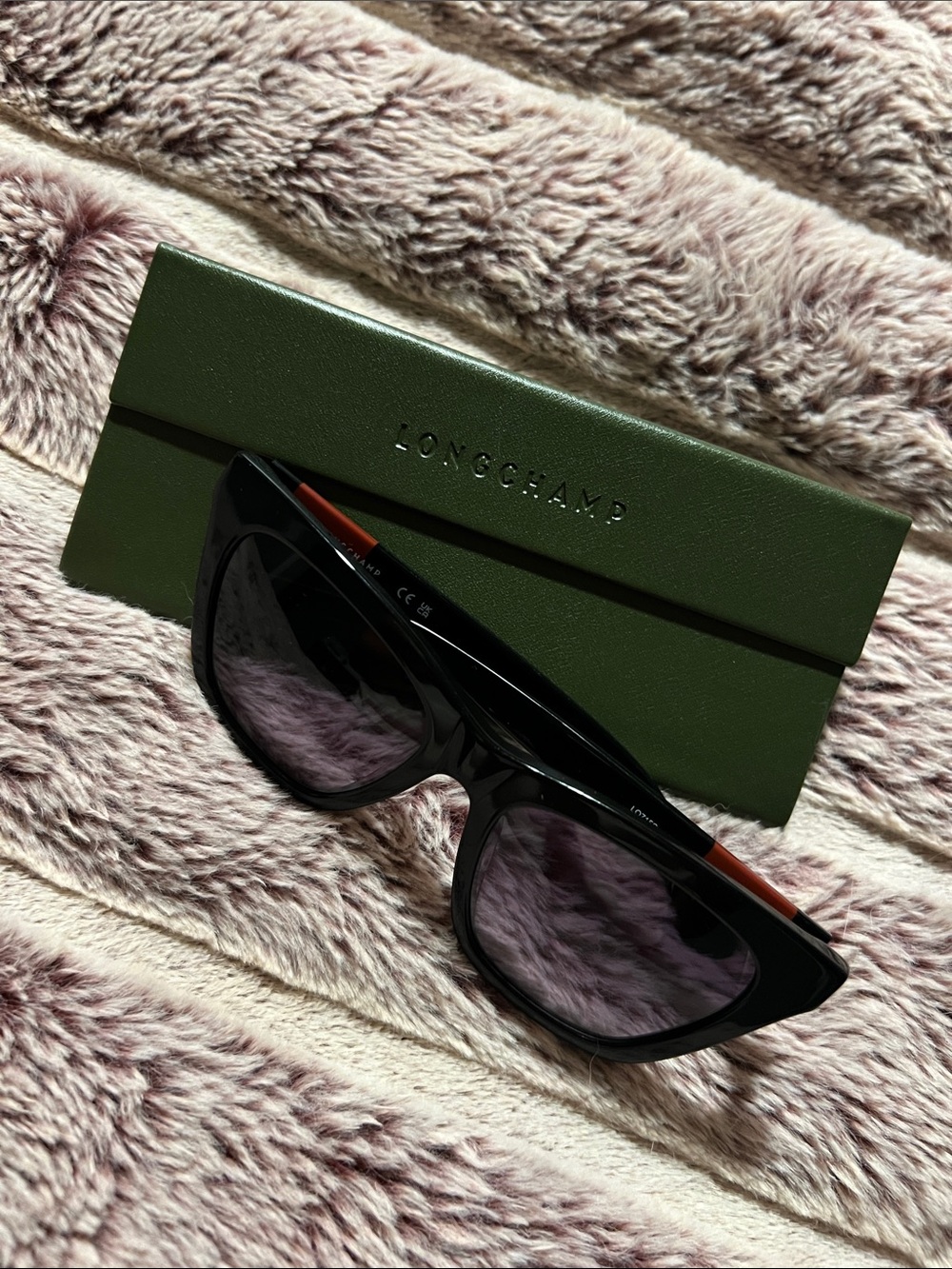 Longchamp Black Cat-Eye Sunglasses with brown Temple Accents